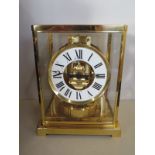 A Jaeger-le Coultre brass Atmos clock model 5833 G2/32 with original box and papers, bought in