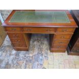 A modern mahogany effect eight drawer pedestal desk, 75cm H x 123cm x 62cm