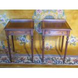 A pair of mahogany lamp tables with a single drawer on turned reeded legs, made by a local craftsman