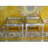 A pair of clear glass nickel and brass trimmed side tables - 50cm W x 41cm H x 50cm D