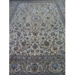 A hand knotted woollen Fine Kashan rug - 420cm x 308cm