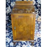 A 20th Century walnut single door cupboard - 76cm x 43cm