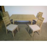 An Ercol oak Romana range dining table in clear matt finish with four chairs, purchased recently