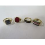 A 9ct yellow gold intaglio ring, a signet ring tests to 9ct, and two other gilt metal rings, no
