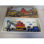 A Corgi toys set 27, machinery carrier with Bedford tractor unit and Priestman cub shovel, with