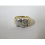 A 14ct gold diamond ring with elephant motif, approx 4.7 gram,s size O/P, some cosmetic wear,