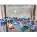 Corgi toys 24 cars and a racing car transporter and hovercraft, including MGA, Austin A40 Ghia L6.