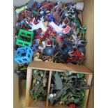 A collection of plastic figures, soldiers etc