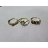 Two 9ct gold rings, and a gilt metal ring, sizes P and N, general wear, bending to one