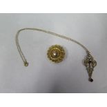 A gilt metal mourning brooch and a seed pearl pendant on chain, total weight approx 9 grams