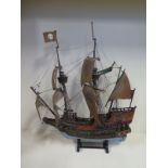 A 1900s model ship of the Golden Hind - with stand, approx 72cm H, 60cm long, condition commensurate