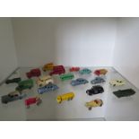 Thirty Lesney diecast vehicles, all with play wear