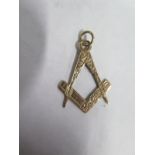 A 9ct gold masonic fob pendant 4cm long, approx 1.8 grams, general wear