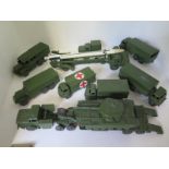 Ten Dinky toy military vehicles including missile erector, all with play wear