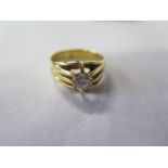 An 18ct yellow gold diamond solitaire ring, size P, approx 6.5 grams, diamond approx 0.70ct, some