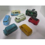 Four Corgi vans including a Volkswagen Toblerone van and three Dinky vans including Bedford Kodak,