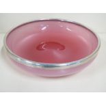 An early 1900s pink Vaseline glass circular bowl having a silver rim with hallmarks for Birmingham