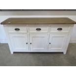 A Portland three drawer sideboard - W150cm x D45cm x H85cm