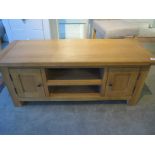 An oak two drawer TV unit - W120cm x D44cm x H50cm