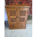 A John Lewis Maharani cabinet with two lattice work doors above a drawer - 95cm H x 73cm x 50cm - in