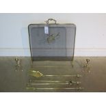 Three piece brass fireside set to include three fire tools, pair of fire dogs and spark guard -