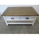 A Portland double sided coffee table - W110cm x D70cm x H50cm