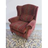 A Home style Furnishing blueberry gents wing back chair 110cm tall, 95cm wide, 92cm deep