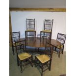 A good quality oval oak dining table - 200cm x 130cm - with a set of six dining chairs including two