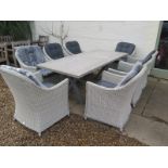 A Bramblecrest Monterey 215cm ceramic rectangle table and eight Monterey armchairs - RRP £2,801