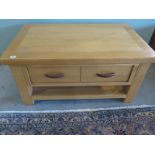 An Imperial oak double sided coffee table - W100cm x D60cm x H50cm