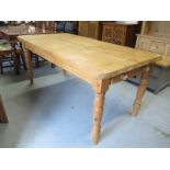 A modern pine kitchen table with two end drawers - 183cm x 93cm