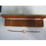 A ladies Giffron 9ct manual wind wristwatch with 9ct hallmarked bracelet strap, total weight