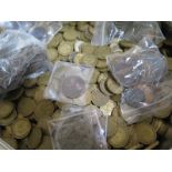 A large quantity of 20th century three pennies - George VI onwards, with some other coins in