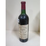 A bottle of Chateau Siaurac Lalande-de-Pomerol 1966 Baronne Guichard - level to base of neck