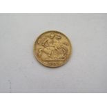 An 1897 Queen Victoria gold half sovereign, approx 3.85 grams, in good condition with some signs