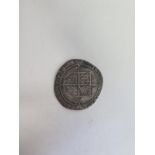 An Elizabeth I coin believed to be a circa 1573 six pence, approx 2.2 grams, approx 2.4mm