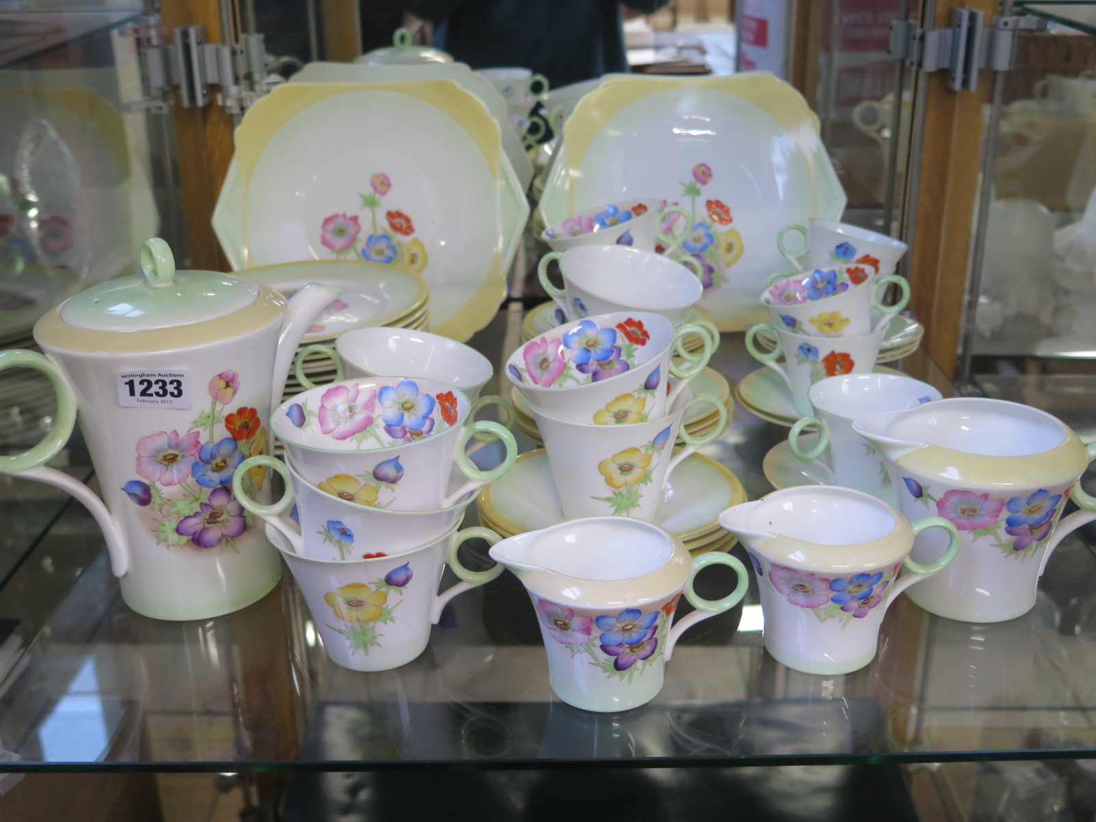 A Shelley floral decorated part tea coffee service - 57 pieces including two sandwich plates,
