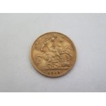 A 1913 George V gold half sovereign, approx 4 grams, in good condition overall but with some signs