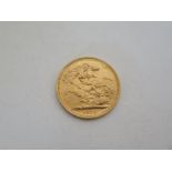 A 1976 gold full sovereign, approx 8 grams, in good condition