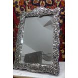 A silver effect easel back mirror - 48cm H x 32cm W