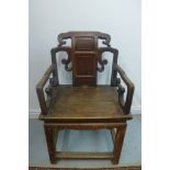 A hardwood carved Chinese open armchair with bat carving detail - 97cm H x 59cm x 45cm