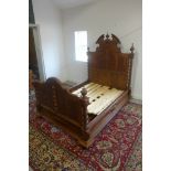 A 19th Century continental walnut double bed with barley twist supports - 186cm H x 150cm W, with