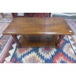 An oak coffee table on turned supports - 47cm H x 106cm x 53cm