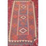 A Kelim rug with bird decoration - 195cm x 100cm - some small wear