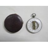 A Johann Holtzmann pocket barometer 5.5cm diameter with leather travel case, generally good, some