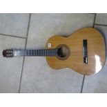 A Lorenzo classical guitar, in a playable condition