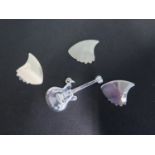 Three silver plectrums, and a silver guitar pendant, approx 0.7 troy oz - all good