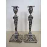 A pair of good quality silver plated Adam style candlesticks - 31cm tall, both in generally good