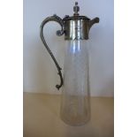A cut glass claret jug with plated top, 29cm tall