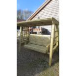A timber garden swing seat
